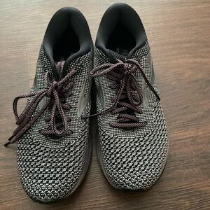 Brooks tennis shoes. Purple metallic bottom. Worn a few times. Size 7